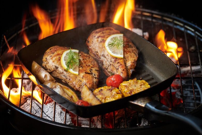 grilled chicken breast flaming grill with grilled vegetables tomatoes herbs lemon rosemary healthy lunch menu 1