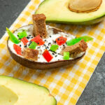 front view creamy avocados with fresh avocado dark grey space 1