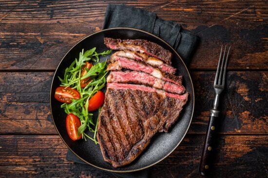 Juicy ribeye steak in Brooklyn NY served at Yaffa NYC